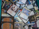 a lot of cards in a blue box on the floor