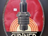 an old metal sign with a red background and a picture of a light bulb