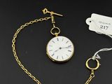 a close up of a pocket watch on a chain with a price tag