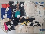 a lot of clothes that are on a table