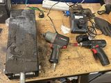 many tools that are sitting on a workbench