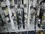 a rack of skis and ski poles in a store