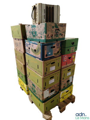 many boxes stacked on top of each other on a pallet