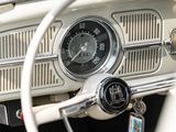 steering wheel and dashboard of a classic car with a clock on the dash