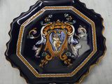 a plate with a picture of a woman and a man on it