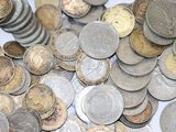 a pile of coins sitting on top of a table