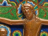 a close up of a statue of jesus on a cross