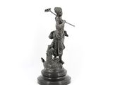 an image of a statue of a woman holding a sword