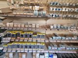 a large display of cigarettes and other items in a store