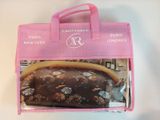 a pink bag with a chocolate covered donut inside of it