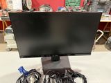 an image of a computer monitor with cables and cords