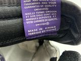 a label on a pair of shoes that says nike and the snooz name and stripes