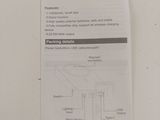 a picture of a white refrigerator with instructions on it