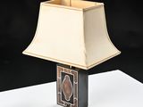 a lamp that is on top of a table