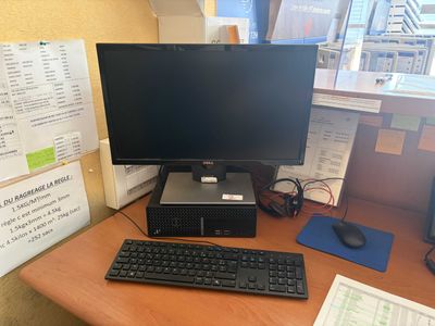 a desktop computer sitting on a desk with a keyboard and mouse