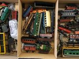 a box full of toy trains sitting on a table