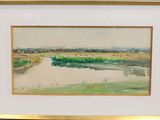 framed watercolor painting of a landscape of a river and a green field