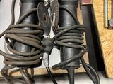a couple of tools that are sitting on a table
