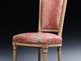 an image of a chair with a pink upholstered seat