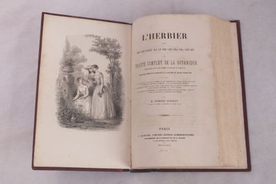 un livre ouvert sur lequel figurent les portraits d'une femme et d'un homme