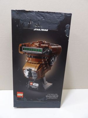 La boîte du véhicule Lego Star Wars est ouverte et prête à être utilisée pour jouer.