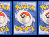 three cards with a picture of a pokemon figure on them