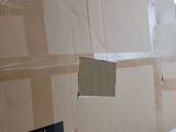 a box that is sitting on the floor in the room