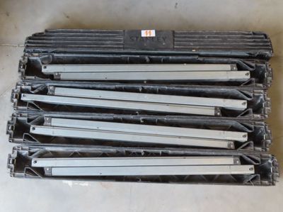 several different types of steel bars stacked on top of each other