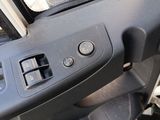 a close up of a car ' s dashboard with buttons and controls
