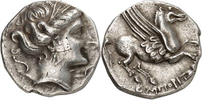 a silver coin with an image of a horse on it