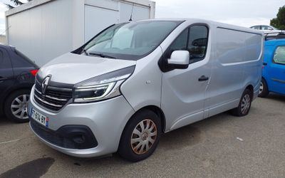 the silver van is parked in a parking lot next to other cars
