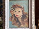 an oil painting of a woman with red hair in a white frame