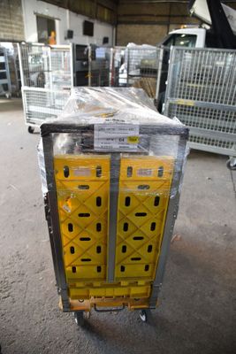 a cart that has some boxes on it in a warehouse