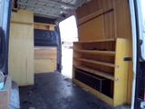 an image of a van with shelves in the back of it