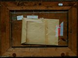 a picture of a piece of brown paper in a wooden frame