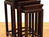 three wooden tables sitting on top of a hard wood floor