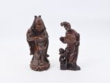 paire de figurines chinoises sculptées d'un homme et d'une femme