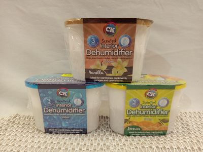 four different flavors of yogurt sitting on a table