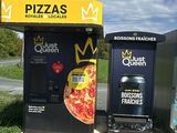 two vending machines on the side of the road