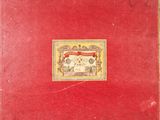 an old red book with a picture of a man on it
