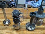 a blender sitting on a wooden table next to a blender