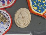 a wax stamp that is sitting on top of a table