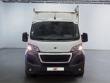 a white van that is parked inside of a building