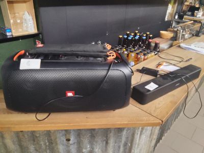 a speaker that is sitting on top of a table
