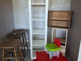 a small table and chairs in the corner of a room