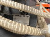 a close up of a machine that has a cord attached to it