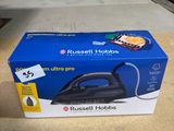 a box of russell hobbss ultra pro steam iron on a table