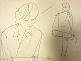 sketches of a man and a woman sitting at a table