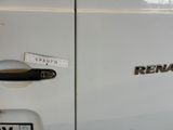 a close up of a car door with a sticker on it