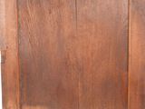 an image of a wooden cabinet with a door open